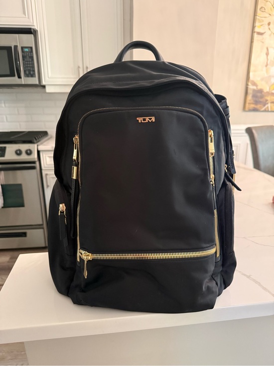 Tumi Handbags - TUMI Black Nylon Voyageur Celina Backpack with Gold Hardware good condition